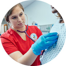 La Roche D E M S N nursing student performing a patient exam during clinical training